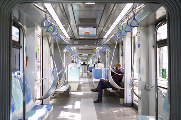 Inside of Izmir Tram, Only a few people is transporting with it because of coronavirus pandemi.