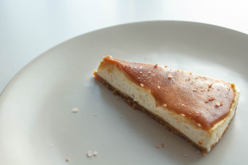 Cheesecake with salted caramel sauce on plate