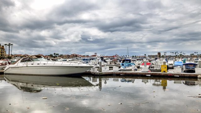 A timelapse of storm clouds moving over Huntington Beach Harbor in southern California.