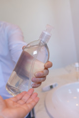 Hands using wash hand sanitizer gel dispenser Antiseptic, Hygiene and Healthcare concept