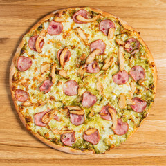 pizza on the wooden backgroun