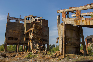 Ruins of abandoned mining headframe buidings