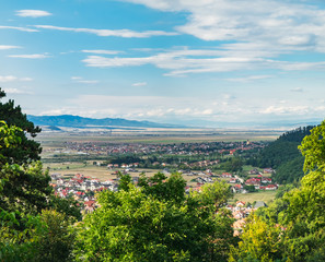 View of Romanian Rasnov town from Rasnov Fortress in Transylvania, Brasov county, Romania.