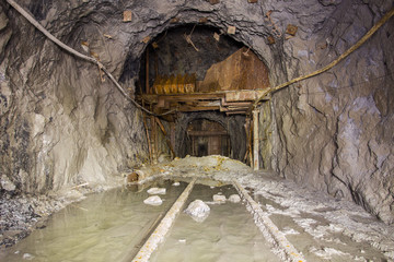 Scoop ramp scraper slide in gold mine underground tunnel