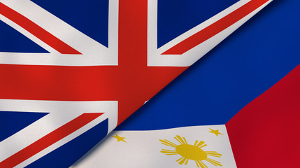 The flags of United Kingdom and Philippines. News, reportage, business background. 3d illustration