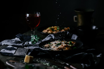 Ravioli with pumpkin and cheese on a dark background