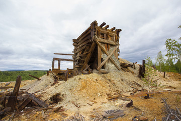 Abandoned ruined wood headframe of copper mine