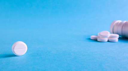 pills on blue background