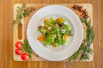lettuce salad with pumpkin and cheese