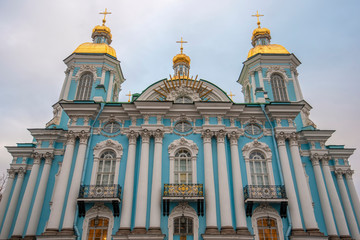 Fototapeta na wymiar Naval Cathedral of St Nicholas (Sailors Cathedral) with the golden domes, located in Glinki street, Saint Petersburg, Russia. Nikolo-Bogoyavlenskiy Morskoy Sobor