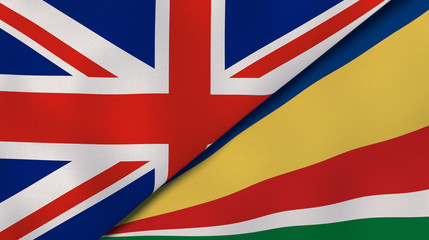 The flags of United Kingdom and Seychelles. News, reportage, business background. 3d illustration