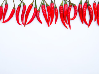 Border top frame with red hot chili pepper isolated on white background with copy space for text design.