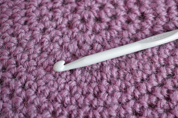 Lilac knitted round carpet or rug. Antique handmade carpet. Home hobby.