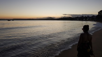 p&ocirc;r do sol na praia