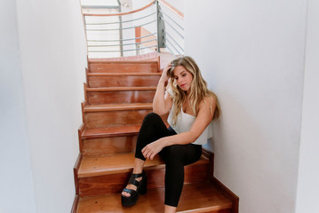 caucasian businesswoman thinking in the stairs