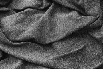 Gray wrinkled fabric texture background. Black and White