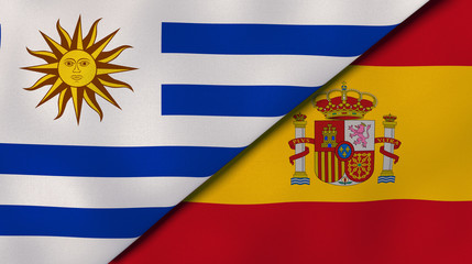 The flags of Uruguay and Spain. News, reportage, business background. 3d illustration