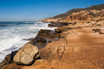Fototapeta na wymiar Red Sandstone Cliffs on The Pacific Coast, Point Loma,Cabrillo National Monument, California, USA