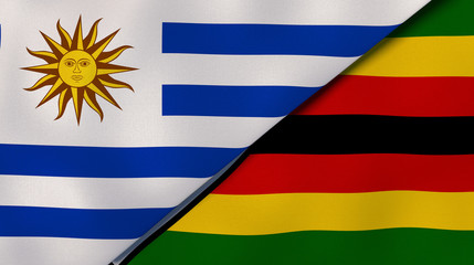 The flags of Uruguay and Zimbabwe. News, reportage, business background. 3d illustration