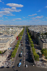 PARIS, FRANCE, EUROPE -Aerial view of Paris, France as seen from the Arch of Triumph on a sunny day with white puffy clouds, shot August 4, 2015