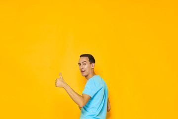 young man painting wall