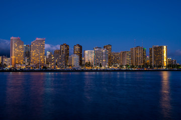 Night view of Honolulu skyline at blue hour, Oahu, Hawaii