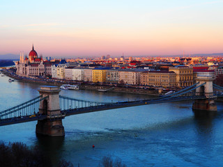 View of the Szechenyi Chain Bridge at sunset in Budapest, Hungary.