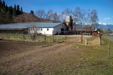 Fototapeta na wymiar Original farm buildings in Slovakia for cows, goats, sheep and pigs