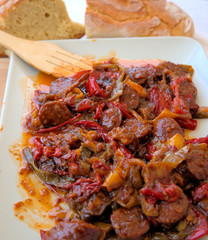 Sausage and peppers, cooked in the pan, traditional Greek food