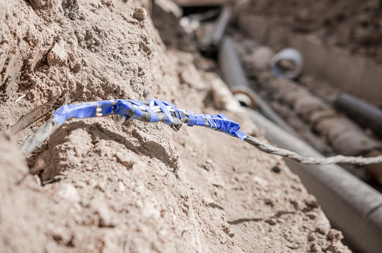 Connection Of An Electric Cable Underground After An Accident At A Construction Site Of A Heating Main. Twist Or Junction Box Electric Cable On Outdoor.