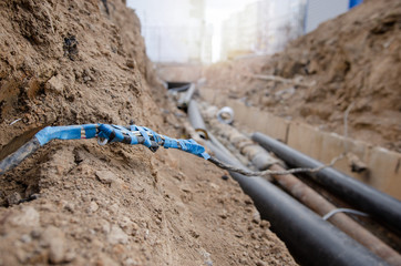 Connection of an electric cable underground after an accident at a construction site of a heating...