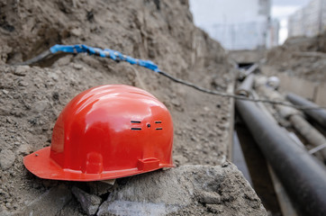Connection of an electric cable underground after an accident at a construction site of a heating main. Twist or junction box electric cable on outdoor.