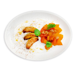 Baked apples and pumpkin with cinnamon