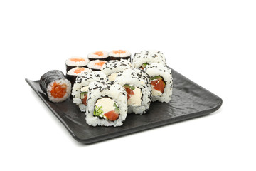 Tray with delicious sushi rolls isolated on white background