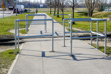 a labyrinth of pedestrian and cyclist safety before crossing the railway tracks