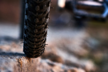 the bike is standing on a cliff