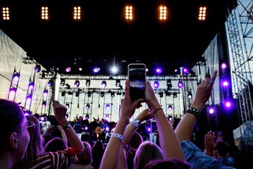 Broadcast concert to the web via mobile phone.