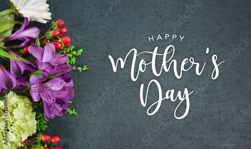 Happy Mother's Day Calligraphy Text with Beautiful Flowers Bouquet and Black Texture Background