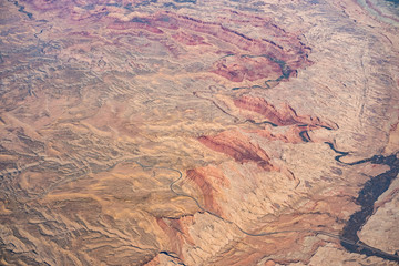 Single road through a desert, mountains, only 1 way through, grand canyon red rock