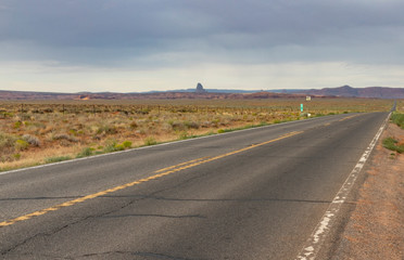 Fototapeta na wymiar long straight road in arizona