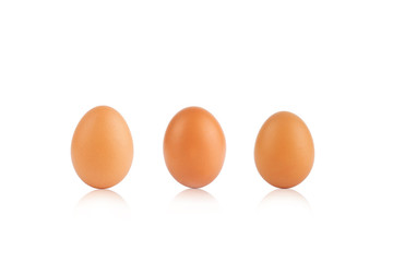 Brown chicken eggs on white background with clipping path