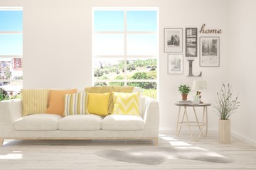 White living room with sofa and summer landscape in window. Scandinavian interior design. 3D illustration