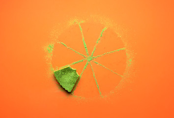 Obraz premium Eaten matcha cheesecake. Bitten cake slice. Matcha powder tart traces