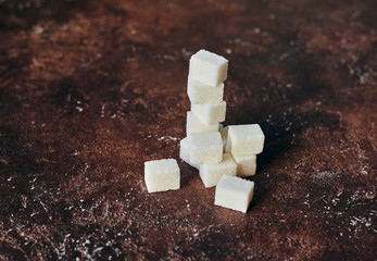 white sugar refined on a brown background