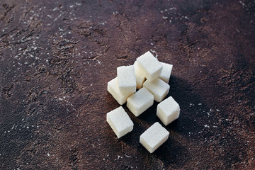 white sugar refined on a brown background