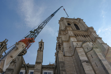 Fototapeta na wymiar Notre Dame de Paris after fire. Reconstruction work in progress after the fire, to prevent the Cathedral Notre Dame de Paris to collapse.