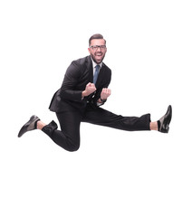 in full growth. happy dancing young businessman