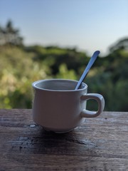 Cup of coffee on wooden table in costa rica