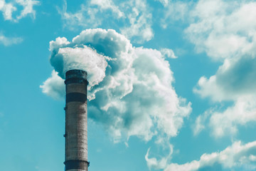 Environmental pollution, environmental problem, smoke from the chimney of an industrial plant or...