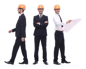 in full growth .a qualified architect in an orange helmet